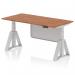 This image shows a sleek and modern dynamic sit-stand desk that is 1600 x 800mm in size. The walnut top and silver legs give it a sophisticated look, while the adjustable height feature allows for comfortable use. The desk also includes a silver steel modesty panel and piste foot for added functionality.
