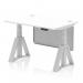 The photograph shows a sleek and modern white top office desk with silver legs and a silver steel modesty panel. The desk is 1200 x 800mm and is height adjustable, with cable ports for easy organization. It also features a piste foot for added stability.