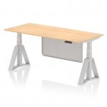 The photo showcases a sleek and modern dynamic sit stand and height adjustable desk. The desk features a 1800 x 800mm maple top with a silver leg and steel modesty panel. There are cable ports for organization and a piste foot for added stability.