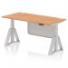 This image shows a dynamic sit stand and height adjustable desk with an oak top and silver legs. The desk measures 1600 x 800mm and features cable ports and a steel modesty panel. The adjustable piste foot provides stability and versatility.