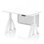 This photograph shows a white top office desk, 1200 x 800mm in size, with adjustable height and a dynamic sit-stand feature. The desk also has cable ports, a white steel modesty panel, and a piste foot for added stability.