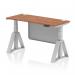 This picture features a dynamic sit stand and height adjustable desk, measuring 1400 x 600mm, with a walnut top and silver leg. It also includes cable ports and a silver steel modesty panel, along with a piste foot for added support.