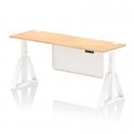 The photo shows a modern, versatile office desk with a sleek maple top and white steel legs. The desk is height adjustable and features cable ports for easy organization. A white steel modesty panel and piste foot complete the look of this dynamic, sit-stand desk.