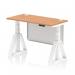 This photograph showcases a modern and versatile work setup with a Dynamic Sit Stand and Height Adjustable Desks Air Modesty. The desk features a sleek oak top, cable ports for organization, and a sturdy white leg with a matching steel modesty panel and piste foot.