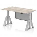 This modern office desk features a sleek grey oak top with cable ports for convenient cord management. The silver leg and modesty panel add a touch of elegance, while the piste foot and dynamic sit stand and height adjustable design provide ultimate comfort and versatility. With a size of 1400 x 800mm, this desk is perfect for any contemporary workspace.