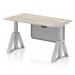 This modern office desk features a sleek grey oak top with cable ports for convenient cord management. The silver leg and modesty panel add a touch of elegance, while the piste foot and dynamic sit stand and height adjustable design provide ultimate comfort and versatility. With a size of 1400 x 800mm, this desk is perfect for any contemporary workspace.