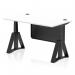 This picture shows a white top, height adjustable office desk measuring 1400 x 800mm with cable ports and a black leg. It also features a black steel modesty panel and a piste foot for added stability. The dynamic sit stand capability allows for customizable comfort and improved posture.