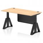 The image shows a sleek and modern dynamic sit stand desk, measuring 1600 x 800mm, with a maple top and black steel legs. The desk features cable ports for easy organization and a black steel modesty panel with a piste foot for added stability. It can be easily adjusted to accommodate different heights for a comfortable and ergonomic working experience.