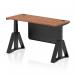 This desk features a spacious walnut top and black steel modesty panel, giving it a modern and sleek appearance. Its dynamic sit stand and height adjustable design allows for customizable comfort, while cable ports and a piste foot add practicality. The perfect addition to any office space.