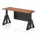 This image features a sleek 1600 x 600mm walnut top desk equipped with cable ports and a black steel modesty panel. The adjustable height and sit-stand capability allows for a customizable workspace, while the black leg and piste foot add a modern and functional touch.