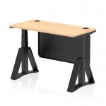 This photograph features a dynamic sit-stand desk, with a 1200x600mm maple top and black steel modesty panel. The desk is height adjustable and includes cable ports, along with black legs and a piste foot.