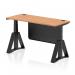 The dynamic sit stand and height adjustable desk features a sleek black steel frame with a stylish oak top. It measures 1400 x 600mm and includes convenient cable ports for a tidy workspace. The desk also has a piste foot for added stability and a black steel modesty panel for privacy.