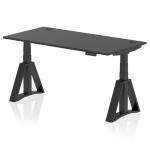 The image shows a sleek black office desk, measuring 1600 x 800mm, with an adjustable height feature. It has built-in cable ports and sturdy black legs with a piste foot for stability. The desk exudes a modern and dynamic feel, perfect for a flexible and ergonomic workspace.