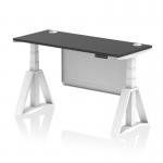 This picture features a sleek black top office desk with white legs and a white steel modesty panel. It has cable ports for organization and a piste foot for added stability. The desk is height adjustable and can easily transition from sitting to standing. Its dimensions are 1400 x 600mm.