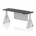 This desk features a sleek black top with cable ports and a silver steel modesty panel. Its 1800 x 600mm size offers plenty of workspace, and the height is easily adjustable to accommodate sitting or standing. The silver legs and piste foot add a modern touch, making it a stylish and functional addition to any office setting.
