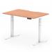 This image shows a modern office desk with a scalloped edge design. It features a 1200 x 800mm beech top and white adjustable legs. The desk is both sit-stand and height adjustable, allowing for a dynamic and versatile workspace.