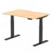 The image showcases a spacious 1200 x 800mm maple top with a scalloped edge on a black leg desk. The desk is equipped with dynamic sit stand and height adjustable features, perfect for any office setting. The sleek design adds a touch of modernity to the workspace.