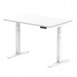 This picture features a modern office desk with a white top and white legs. The desk has a scalloped edge and is 1200 x 800mm in size. It can be adjusted for height, allowing for both sitting and standing positions. It has a sleek and dynamic design, perfect for any contemporary workspace.