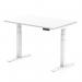 This picture features a modern office desk with a white top and white legs. The desk has a scalloped edge and is 1200 x 800mm in size. It can be adjusted for height, allowing for both sitting and standing positions. It has a sleek and dynamic design, perfect for any contemporary workspace.