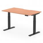 This image shows a Dynamic Sit Stand and Height Adjustable Desk, featuring a scalloped edge and a beech top with black legs. The desk measures 1400 x 800mm and is designed for use in an office environment. Its adjustable height allows for comfortable sitting or standing positions.