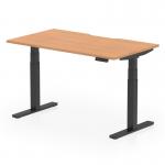 The photo shows a sleek and modern office desk with a scalloped edge oak top and black adjustable legs. It features a dynamic sit stand design, making it easy to change positions throughout the day. The desk is 1400 x 800mm in size and is perfect for any office setting.