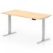 The photo shows a dynamic sit-stand desk with a scalloped edge and a maple top, supported by silver legs. The desk measures 1600 x 800mm and is height adjustable, making it suitable for use in any office setting.