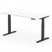 The photo shows a sleek and modern office desk with a white top and black legs. The desk is spacious with dimensions of 1600 x 800mm and features a scalloped edge design. It is also height adjustable, allowing for easy transition between sitting and standing positions.