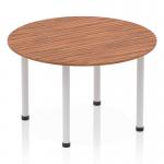 The image features a sleek and modern Dynamic Round Tables Impulse 1200mm Round Table with a rich Walnut top and Silver post leg. The table exudes a sense of efficiency and sophistication, perfect for any workspace or social setting.