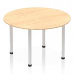 This image showcases a dynamic round table, measuring 1200mm in diameter. It features a maple top and silver post leg, creating a sleek and modern look. With its curved and fluid design, this table is perfect for creating an inviting and collaborative space.