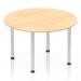 This image showcases a dynamic round table, measuring 1200mm in diameter. It features a maple top and silver post leg, creating a sleek and modern look. With its curved and fluid design, this table is perfect for creating an inviting and collaborative space.