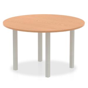 Click to view product details and reviews for Impulse 1200mm Round Table Oak Top Silver Post Leg I000788.