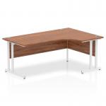 A sleek and professional office desk, the Dynamic Corner Desks Impulse features a 1800mm walnut top and white cantilever leg. Its right crescent shape adds a modern touch to any workspace.
