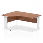This image showcases a sleek and modern Impulse 1600mm left crescent office desk with a walnut top and white cable managed legs. The dynamic corner design maximizes space and adds a touch of sophistication to any office environment.
