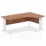 The photo shows a sleek and modern dynamic corner desk with a 1800mm left crescent design. The desk has a walnut top and white cable-managed legs, giving a professional and organized look. Perfect for any office setting.