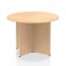 The picture captures a modern round table with a maple top and arrowhead leg design. Its dynamic shape and bold lines make it a striking addition to any space.