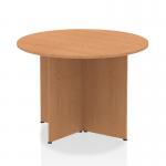 This image features a dynamic round table, with a 1000mm oak top and arrowhead legs. The table has a sleek and modern design, perfect for any contemporary space. The warm tones of the oak top add a touch of natural beauty, while the unique shape of the legs adds a touch of visual interest. This table is both functional and stylish, making it a great addition to any room.