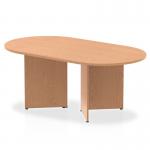 In the photo, you can see a spacious and modern dynamic boardroom and conference table. The table is 1800mm in length and features an oak top and arrowhead legs. The table exudes a sleek and professional aesthetic, making it perfect for productive meetings and presentations.