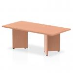 This photo features a sleek Dynamic Coffee Tables Impulse coffee table with a stunning 1200mm beech top and distinctive arrowhead legs. The modern design adds a touch of style to any living space.