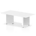 In the photograph, we see a sleek and modern 1200mm coffee table, featuring a white top and unique arrowhead legs. The dynamic design adds a touch of elegance to any living space.