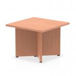 This photo features a dynamic coffee table, measuring 600mm, with a beech top and arrowhead legs. The sleek design and rich wood finish add sophistication to any living space.