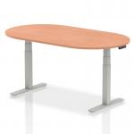 At the center of the room sits a sleek, modern boardroom table with a beech top and silver height adjustable legs. The table is surrounded by comfortable chairs, ready for a dynamic and productive meeting with colleagues and clients. The natural light streaming through the windows highlights the professional atmosphere and encourages creative collaboration.