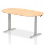 In this image, a modern and sleek boardroom is filled with a large dynamic conference table. The 1800mm table features a maple top and silver adjustable legs, creating a professional and high-quality setting for business meetings and presentations. The space is bright and inviting, with ample room for collaboration and discussion.