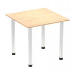 This image features a dynamic Impulse 800mm square table with a maple top and chrome post leg. The table exudes a modern and sleek look, great for any office or meeting space. The maple top provides a warm and inviting feel, while the chrome post leg adds a touch of sophistication. Perfect for creating a versatile and stylish workspace.