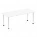 The photograph shows a 1800mm straight table with a white tabletop and chrome post leg. The sleek design and modern finish make for a stylish addition to any space. The dynamic tables impulse adds a touch of sophistication to any room.