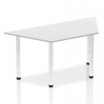 The image captures a modern, sleek office environment with a white trapezium-shaped table top and chrome post legs. The tables appear dynamic and versatile, perfect for a collaborative and efficient workspace.