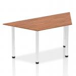 This picture showcases a sleek and modern Dynamic Tables Impulse 1600mm trapezium walnut top with chrome post legs. The clean lines and stylish design exude professionalism and sophistication. The rich walnut color adds warmth to any room.