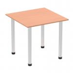In the photo, a sleek and modern Dynamic Tables Impulse 800mm square table can be seen with a beech top and brushed aluminium post leg. The table exudes sophistication and professionalism, making it a perfect addition to any workspace or meeting area.