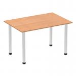 The photo showcases a sleek and modern Dynamic Tables Impulse 1200mm straight table, with a stunning oak top and brushed aluminium post leg. Its clean lines and elegant design make it a perfect addition to any workspace or meeting room. The natural wood grain adds warmth and sophistication to the overall look.