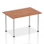 The image shows a sleek and modern Dynamic Tables Impulse 1400mm straight table. The top is made of rich walnut wood, with a brushed aluminium post leg supporting it. The table exudes elegance and sophistication, perfect for any contemporary office space or meeting room.