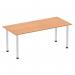 In this photograph, we see a sleek and modern Dynamic Tables Impulse 1800mm Straight Table. The top is made of oak with a brushed aluminium post leg, creating a polished and professional look. The table appears sturdy and spacious, offering plenty of room for working or collaborating.